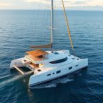 Top Catamaran Destinations: Sail Tranquil Waters from Caribbean to Southeast Asia